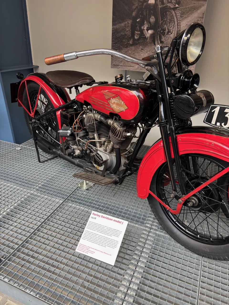 Red vintage Harley-Davidson motorcycle on display in Prague